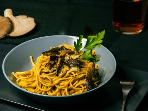 A photo of the dish creamy butternut squash pasta with  mushrooms