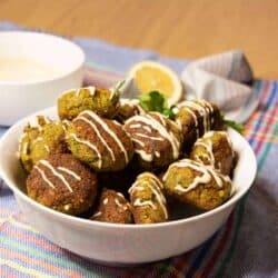 Plated falafel with tahini sauce