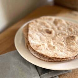 a pile of freshly baked spelt tortilla breads