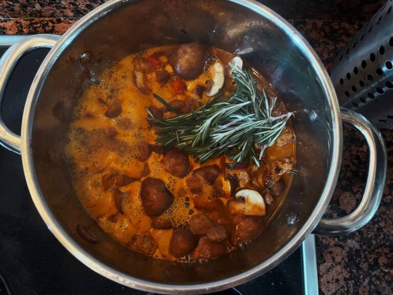 simmering pot of goulash in with soy protein